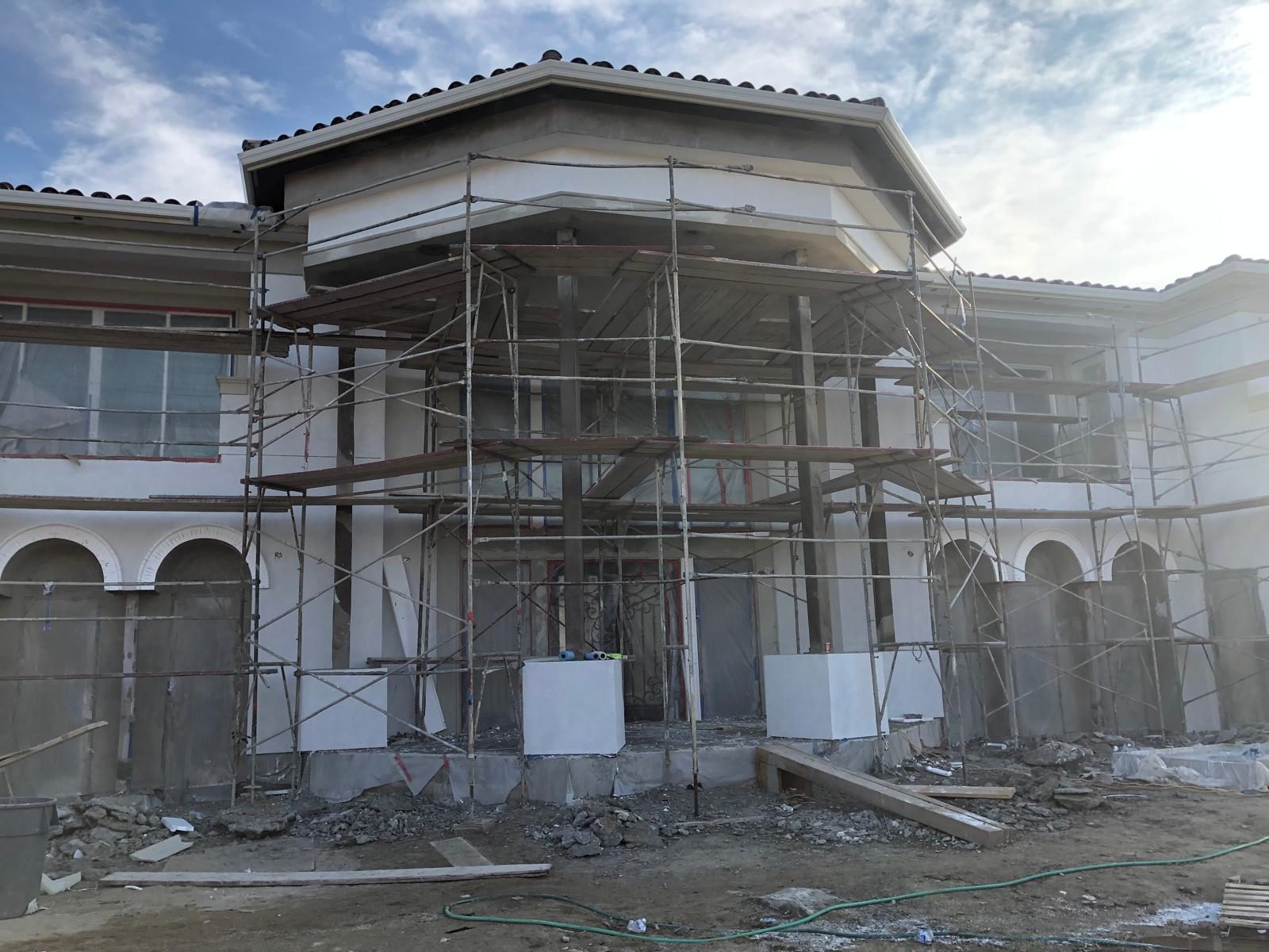 Custom mansion ground-up construction by JMG Construction — after