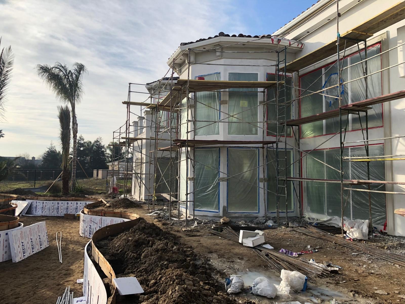 Custom mansion ground-up construction by JMG Construction — before